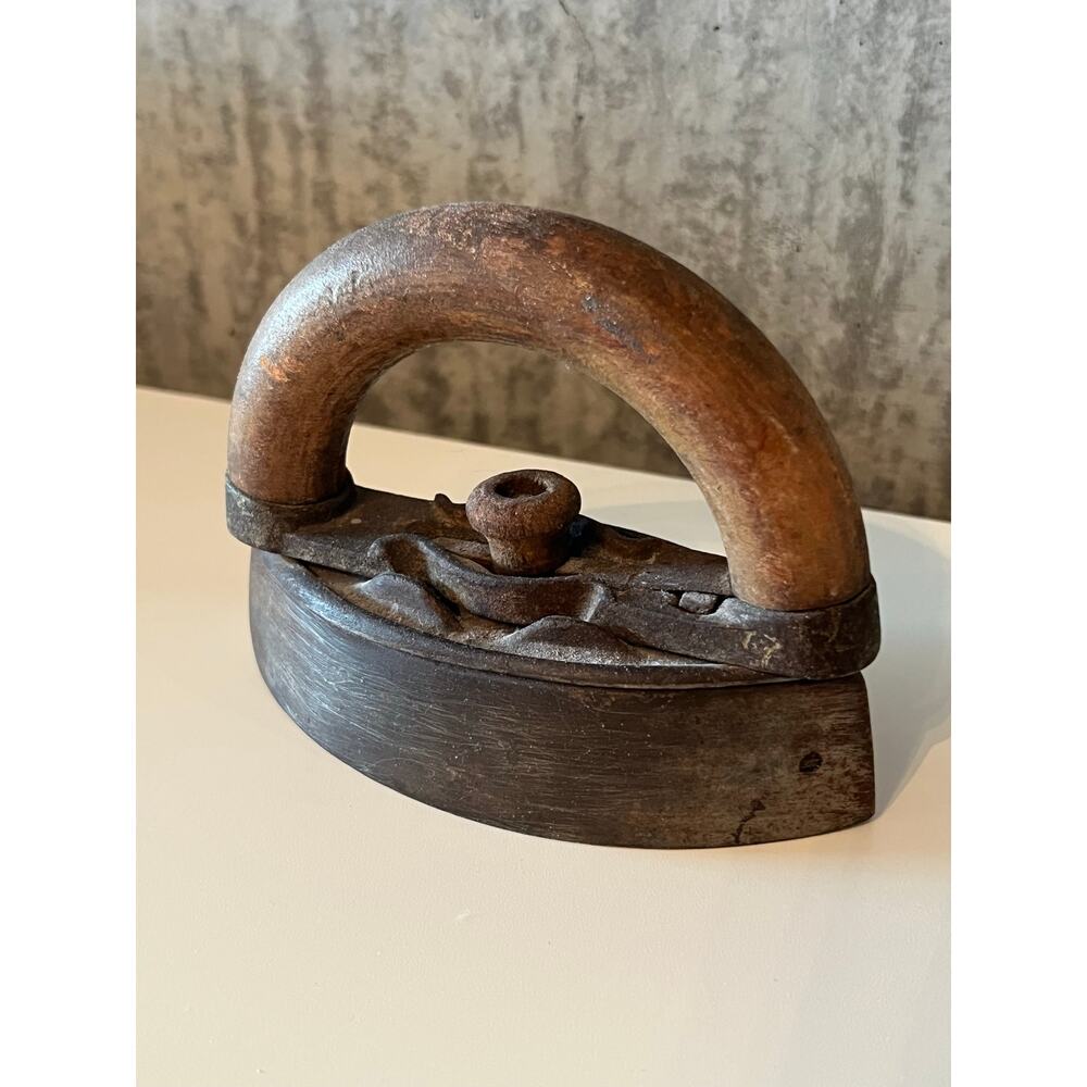 Adorable antique miniature "sad" iron with wood handle